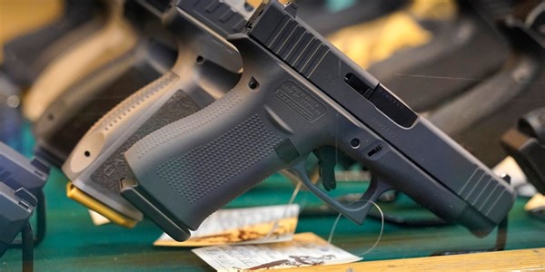 Bill to allow people with certain permits to carry guns in businesses that prohibit, restrict firearms