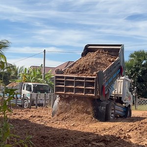 2.7K views · 52 reactions | Dump truck and tractor pushe land to make new village | Actions | Facebook