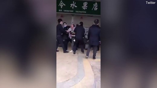 Video: Chinese woman appears to be dragged by police for not wearing a mask | Daily Mail Online