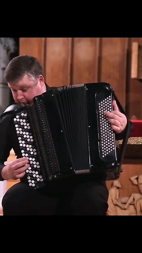 Alexandr Hrustevich performing Vivaldi's "Winter" (The Four Season, Concerto No. 4 in F minor, Op. 8, RV 297, "Winter": I. Allegro non molto) on a bayan (a Russian accordion). | Mensa Saskatchewan
