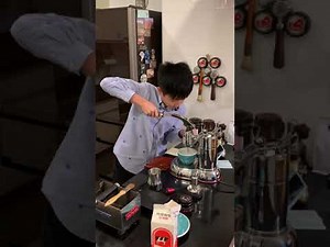 Pulling coffee latte with La Pavoni lever machine