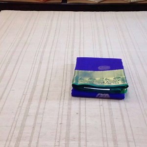 This silk sari is a rich purple infused with indigo. Large gold coin...