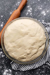 Refrigerator pizza dough lets you enjoy homemade pizza anytime a craving hits. Stir the ingredients together, let the dough rise, and it’s ready to use for up to 2 whole weeks. https://thestayathomechef.com/refrigerator-pizza-dough/ | The Stay At Home Chef