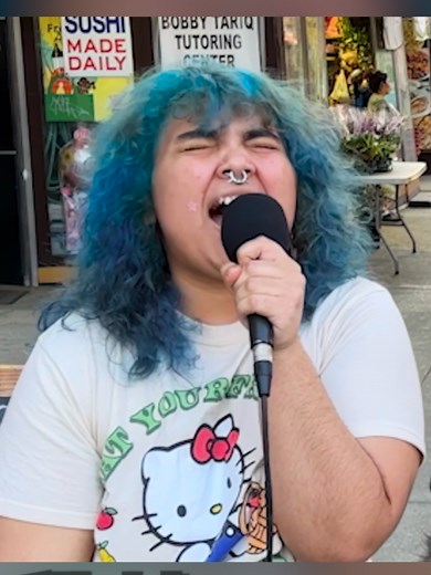 Captivating Crowd with Heartfelt Singing Performance