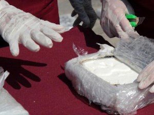 Police: Woman hiding cocaine in breast implants