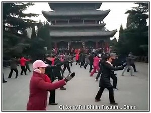 Come sunrise… parks and public areas across China, and increasingly the rest of the world, fill up with people doing Qigong and Tai Chi. The benefits of Qigong and Tai Chi… on Body, Mind and Spirit have been celebrated by individuals worldwide. In the video... Master Yang Jun leads a large group of people at Tayuan, China. | Qigong is a Way of Being