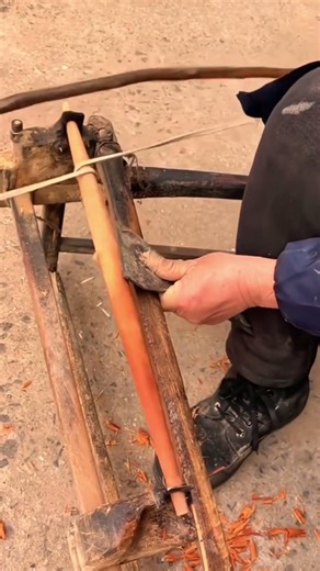 traditional tool for smoothing wood logs