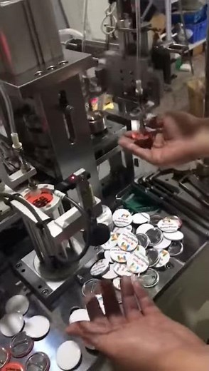 Looking at 37MM AUTOMATIC BUTTON MACHINE.We custom Automatic button badge making machine.