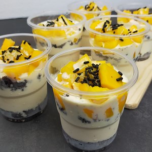 94K views · 2.1K reactions | No Bake Dessert Mango Cake Float in Cups Ingredients: 2 med. sweet ripe mangoes (cut into cubes) 5 piece Cream-O cake (crushed) 200 ml creamy condensed milk (chilled overnight) 130 ml all-purpose cream (chilled overnight) Chocolate sprinkles (optional) #dessert #MangoFloat #drealcooking | D Real Cooking | Facebook