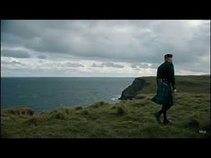 Scotsman Walking On The Mull of Kintyre Headland On History Visit To Kintyre Peninsula Scotland