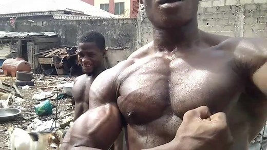 Strong, Black, African bodybuilders in the field fetching for muscle #gymlife #fitness #gym