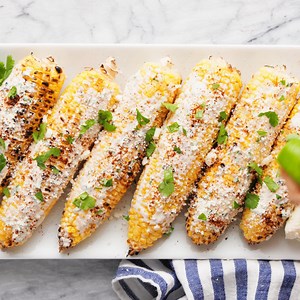 One bite of this Grilled Mexican Street Corn and you'll be in heaven! Printable Recipe --> https://www.simplyrecipes.com/recipes/grilled_mexican_street_corn_elotes/ | Simply Recipes