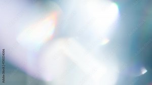 Prismatic Light Effects. Loop. The light passes through the facets of a slowly rotating diamond and creates repetitive sparkling highlights and rainbow colors