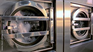 Large industrial washing machines in the hotel laundry
