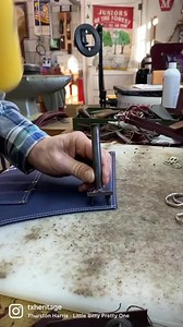 Adding an attachment point for one of the shoulder straps on a non waxed Classic Apron. A leather strap and some copper rivets get the job done with style..We make things like they used to..#txheritage #txheritageapron #shopapron #workshopapron #apron #classicapron #woodworkingapron #woodworking #workshop #madeinamerica #madeinusa #madeintexas | Texas Heritage Woodworks