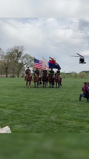 The Commanding General's Mounted Color Guard preps for the Kentucky Derby today on Cavalry Parade Field with help from 1st Combat Aviation Brigade, 1st Infantry Division. This ensures the horses remain steady under the roar of passing aircraft. | Fort Riley