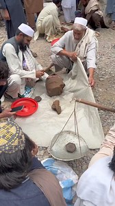 In Tirah valley hash market. A farmer is selling his hash bucket and breaking with axe to weight. | Morning Post Swat