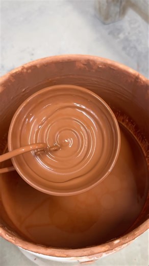 Glazing spiral slip textured pottery dishes #pottery #clay #ceramic #handmade #glaze #rustic #artist
