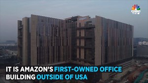 62K views · 1.1K reactions | 290 conference rooms & 49 elevators... all-day cafeteria & a helipad... 9.5 acre campus with 15,000 seats for employees. Amazon.com opens its biggest campus building in the world, in Hyderabad | CNBC-TV18 | Facebook