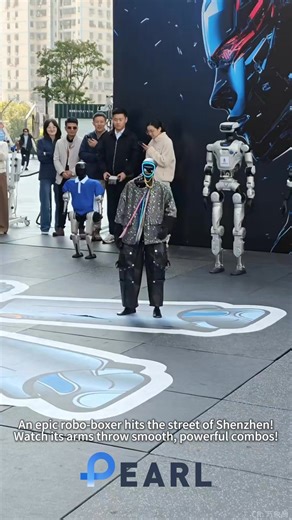 An epic robo-boxer hits the street of #Shenzhen! Watch its arms throw smooth, powerful combos.💪 Pure power and agility —you’ll just wanna yell “SO COOL” after watching! #robot #boxing #shenzhenlife | PEARL GBA