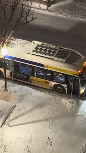 a bus stop but it's snowing at night #minneapolis #minnesota