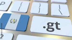 Guatemalan domain .gt and flag of Guatemela on the buttons on the computer keyboard. National internet related 3D animation
