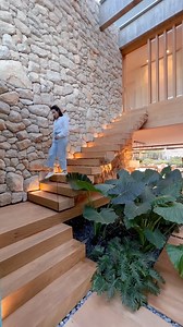 What do you think about this staircase featuring a small tropical garden attached to it? Which part is your favorite? The staircase of Casa Bosques C7 by @martinarquitetura, located in Xangrilá/RS, #Brazil, landscape design by @susananedel and built by @mrtn.inc. #staircase #stairs #stairdesign #moderninterior #courtyards #backyard #contemporaryhouse #interiordesign #interior #wood #iron #stone #stonewall #cladding #woodstairs #tropicalgarden #landscapedesign #staircasedesign #architects_need | 