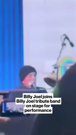 American singer-songwriter Billy Joel surprised fans in the US by taking the stage with a tribute band dedicated to his music for an unexpected live performance. | The Project
