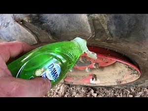 Easy trick to get a tractor tire back on the rim!