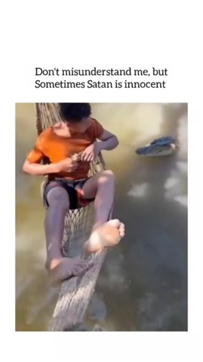 Pubewitty on Instagram: "The video captures a scenario where a young man, initially relaxed and sitting in a hammock over murky water, suddenly faces an unexpected threat from an alligator emerging from the water. His immediate reaction, grabbing onto one side of the hammock to maintain balance, showcases a blend of surprise and instinctive self-preservation. This sequence highlights the unpredictability of nature and the importance of vigilance when in close proximity to wildlife. The man’s qui