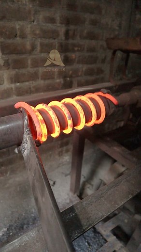29K views · 185 reactions | Inside the factory where shock springs are handcrafted with accuracy and power! From metal rod heating to coil winding and tempering — the full process revealed. #ShockSpring #SpringManufacturing #CoilSpring #FactoryProcess #IndustrialWork #EngineeringArt #MetalWork #ManufacturingVideo #USAFactory #viralreelschallenge2025viralreelschallengejaiviralreelschallengeviralreelschallenge | A2Z Skills | Facebook