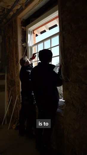 A look at the process of fitting a sash window into its existing box on site in Putne...