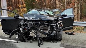 Driver going 115 mph drags Va. state trooper stuck in door for 3 miles