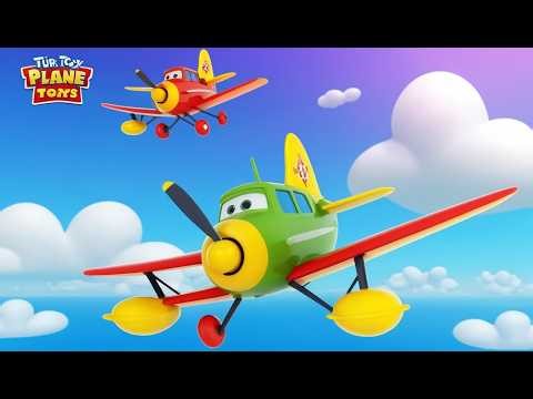 Quatre petits avions jouets volent