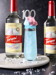 1.8K views · 11 reactions | Sweet, fizzy, and bright! 壟 Celebrate 100 years with limited-edition Torani Puremade Diamond Syrup—perfect for sparkling mocktails! ✨ Recipe: https://ow.ly/zptr50UnMgE | Torani | Facebook