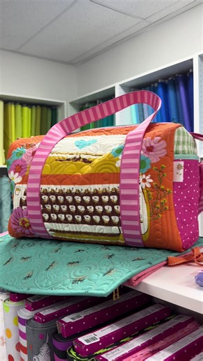 Kitting you not it’s Thursday! This week we are featuring your favorite duffle bag! We only have 4 left so make sure to grab them before they are gone. This duffle bag is @Stitched by Irene 🧵 ❌ version of the patchwork duffle mini bag by @knot thread ! #orchidowlquilts #localquiltshop #dufflebag #quiltkit #quiltbag