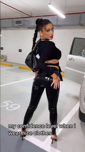 Girl in vinyl leggings