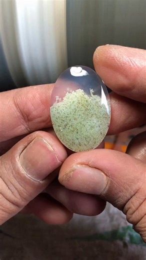 Yazid Ikhsani on Instagram: "This cabochon is shaped from moss agate featuring milky white chalcedony with fine pale green moss inclusions. A clean contrast, stable material, and even texture make it ideal for a smooth dome and high polish. ✨ #MossAgate #Chalcedony #CabochonMaking #LapidaryArt"
