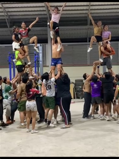 Cheerleading Pyramid Stunts in CHAS '26 Mafia Theme