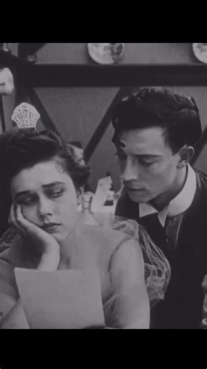 Art Deco Joe on Instagram: "Buster Keaton as a waiter taking an order for coffee in “The Cook” 1918 The restaurant guest, unfazed by Buster, is played by Miss Marion Sproul of Chico, California. Marion, and her friend Doris Smith sitting across from her, were last minute walk on extras. Miss Sproul was not a Hollywood actress but a socialite and heiress from Chico, California who met Arbuckle at a recent charity event and was invited by him to visit his studio. Marion and her friend took him up 