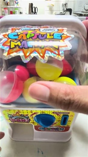 PLAYING THE CAPSULE MACHINE #trendingshorts #viralshort #toys