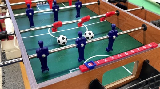 mini Foosball table or Table Soccer goal moment (two balls)