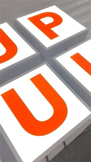 Trimcap frontlit channel letters with colored vinyl combine sleek design with vibrant visual impact.