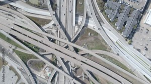 Massive Houston Freeway Intersection. Huge Highway intersection of I69 and I610. Top down aerial shot of the I610 and I69 Interchange in Texas. Establishing Drone Shot.