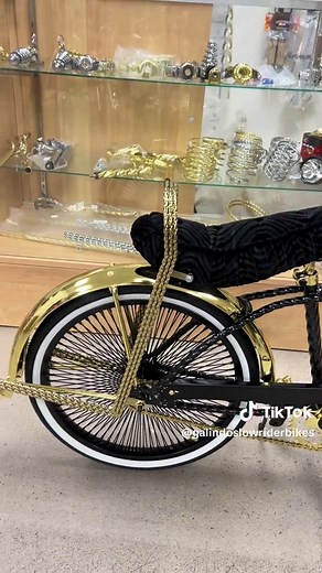Another black/gold 20 Inch lowrider bicycle ready to go to its new home. We switched it up a bit on this one did triple twisted front support bar and sissy bar. Also added a gold steering wheel and golo man sporcket #lowriderbike #lowriderbicycle #lowriderlifestyle #lowrideraddicts #lowriderbikeshop #lowridershop #golddigger #blackgold #blackandgold #staybuilding #lowriderculture #lowridercarshow #lowridermagazine