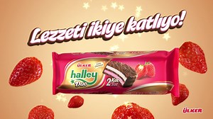 Halley şimdi de iki kat, iki tat oldu. Marshmallowun içi çilek lezzeti ile doldu, üstüne bir de kakaolu bisküvi kondu. Enfes sütlü Ülker çikolatası ile nefis oldu. | Halley