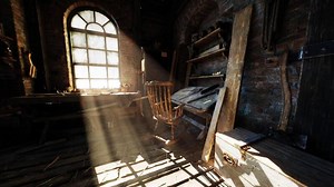 Old carpentry workshop filled with vintage tools and sunlight streaming in