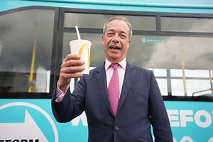 Nigel Farage dances in white fur coat at Clacton Pier in bizarre rap video