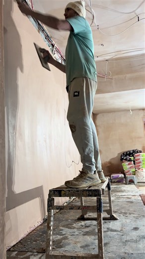 Perfecting Plastering with a Plastic Trowel