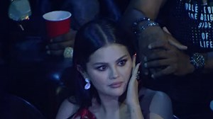 Selena Gomez winces in concern during Olivia Rodrigo's VMAs performance